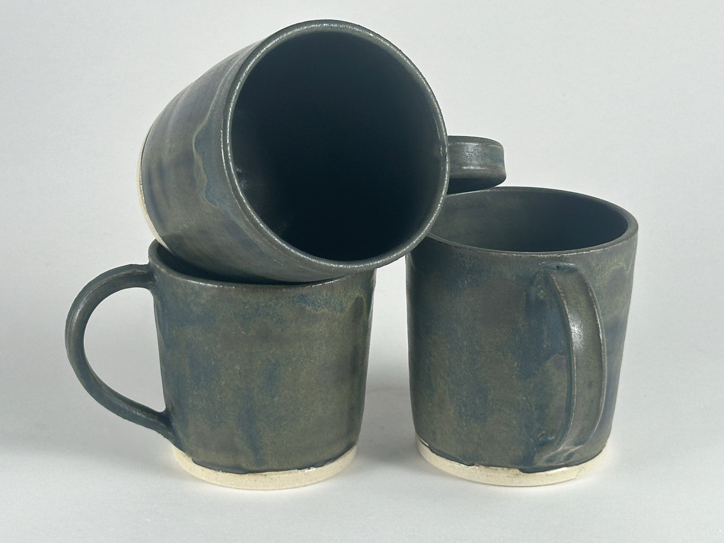 Small dark green mugs